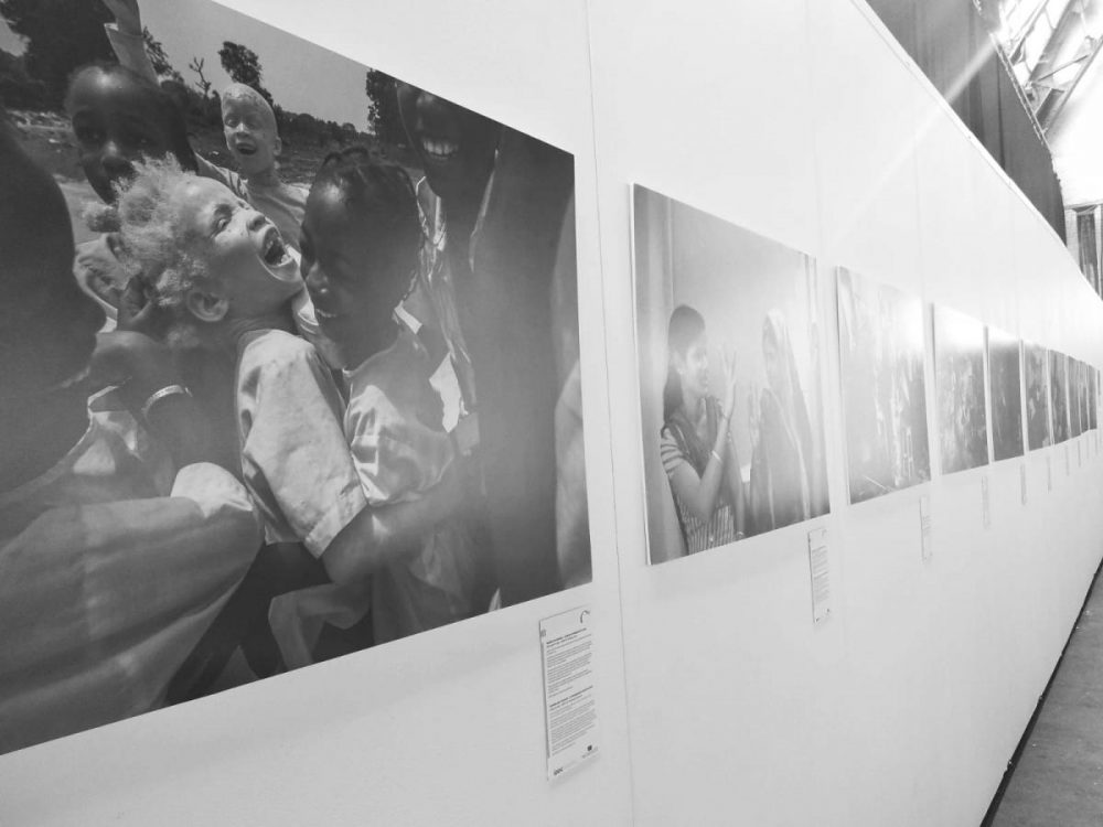 Photo exhibition of children on the wall