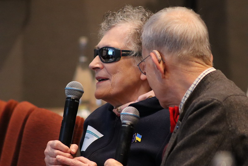 Bernaddette Pilfoy speaks from the panel next to another French representative
