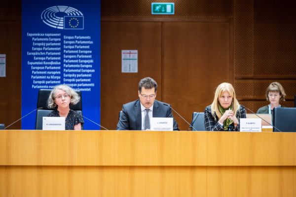 Panellist in the stage while Commissioner Lernarcic speaks