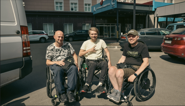  Oleksandr, Oleksiy and Vitaliy., three man in wheelchair