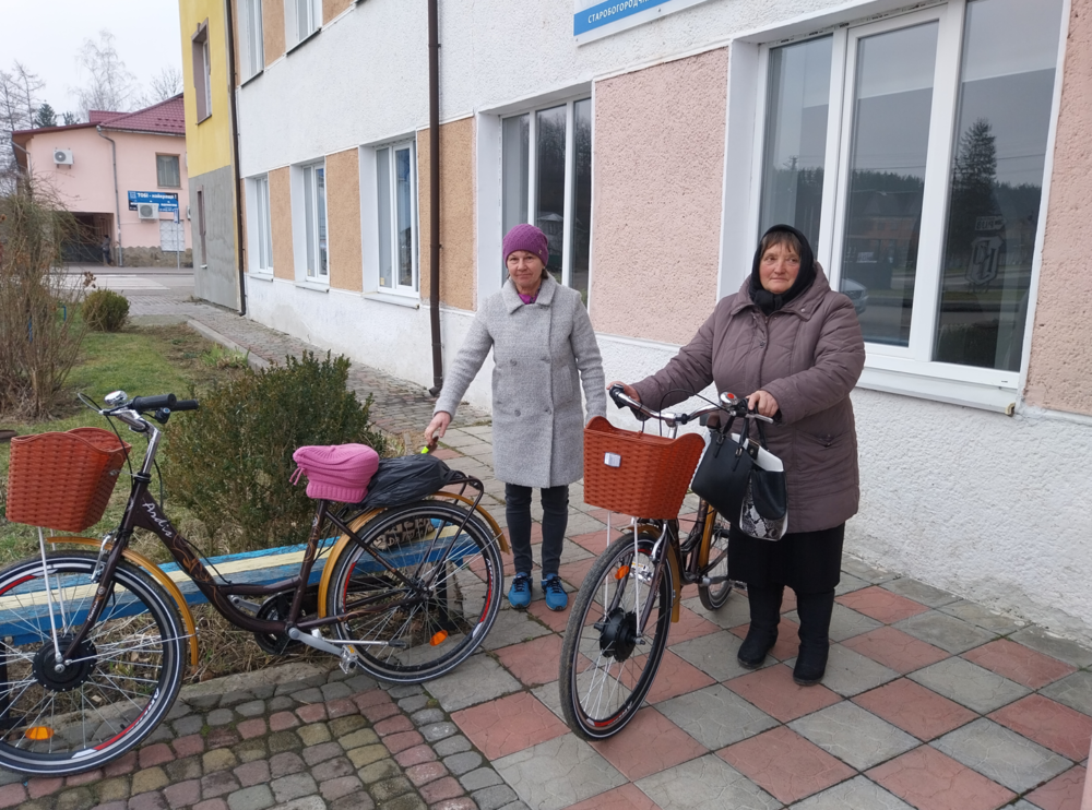 Social workers with the bicycles donated