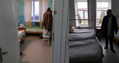 On the left a room in a military hospital; and on the right a room in the public hospital. Both have maximum 70cm gaps between beds, which are also not adjustable.