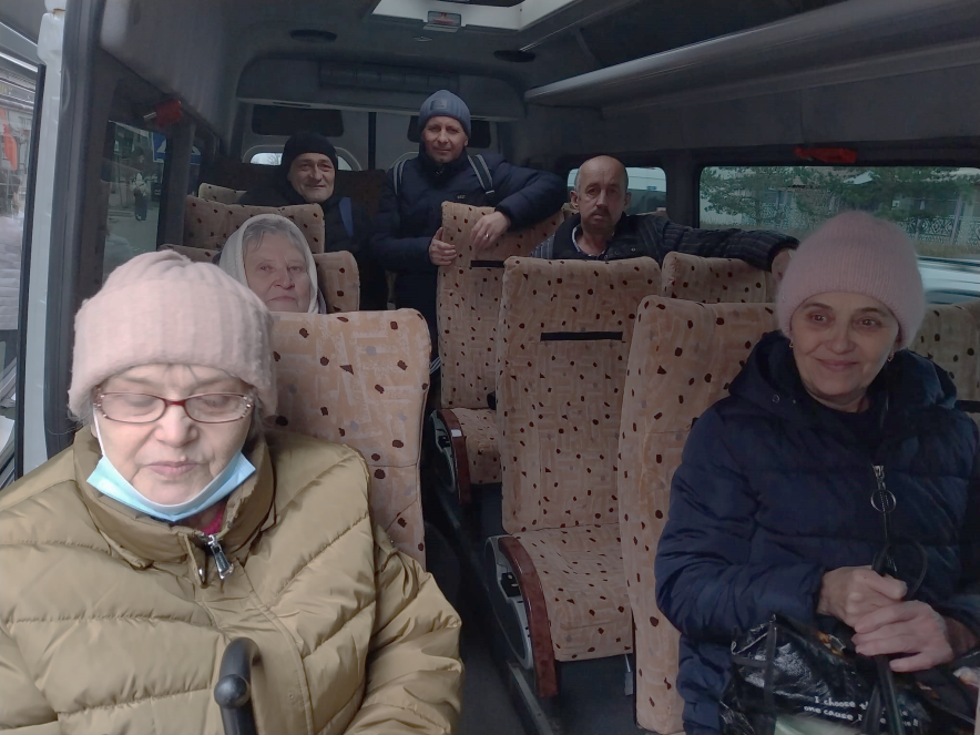 A group of people in a bus.