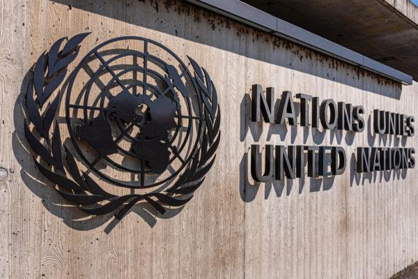 United Nations sign located outside the United Nations Office in Geneva